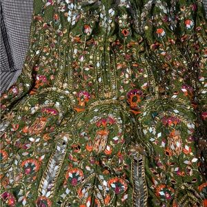 Indian 
Lehanga 
Color green 
Fabric 
Silk 
Size  EX Small
Waist 24 
Length 41